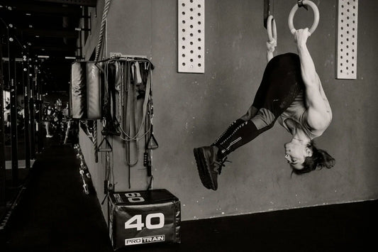 Person exercising with weights at gym to improve workout performance and fitness training results